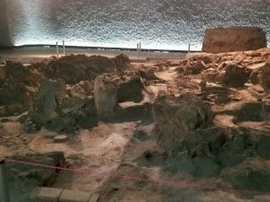 Two neolithic dwellings by Zoë Sheng